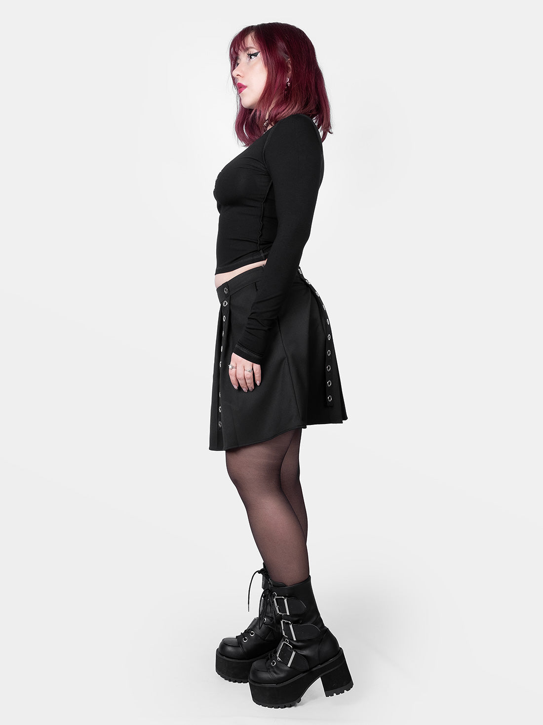 Abyss Eyelets Pleated Mini Skirt