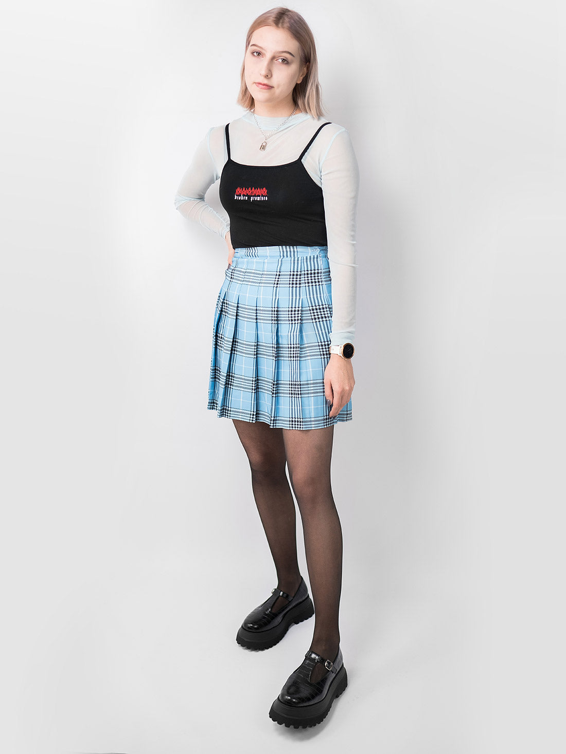 Uszyta ręcznie w Polsce, tall tennis skirt o klasycznym kroju i wysokim stanem, w niebieską kratę. Zdjęcie 7